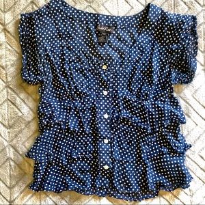 Polka dotted ruffle button up shirt